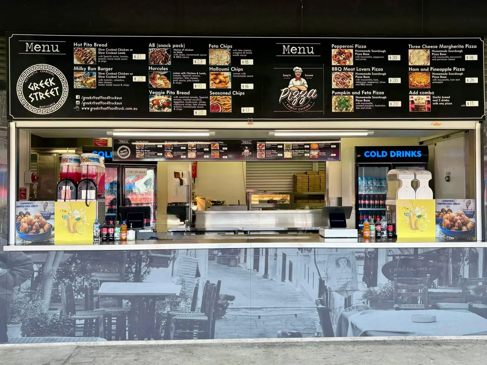 The Joey's Pizza House and Greek Street kiosk inside the stadium, with menu boards above the counter